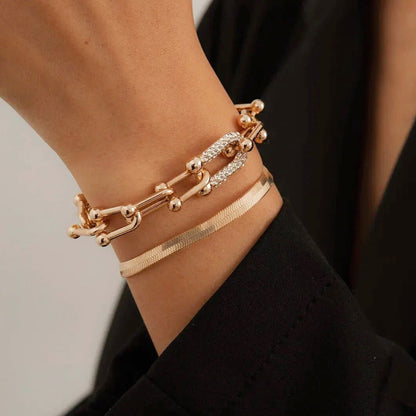 https://cdn.shopify.com/s/files/1/0820/4999/0943/files/2pc-statement-chain-lock-herringbone-bracelet-712057.jpg?v=1762198076