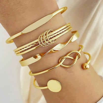 https://cdn.shopify.com/s/files/1/0820/4999/0943/files/5pcs-twist-bangle-bracelet-stack-445933.webp?v=1762198465