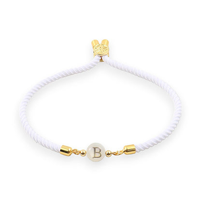 https://cdn.shopify.com/s/files/1/0820/4999/0943/files/adjustable-dainty-letter-initial-bracelet-821527.jpg?v=1712446128