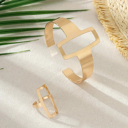 https://cdn.shopify.com/s/files/1/0820/4999/0943/files/adjustable-geometric-rectangle-bracelet-and-ring-set-165494.webp?v=1718190962