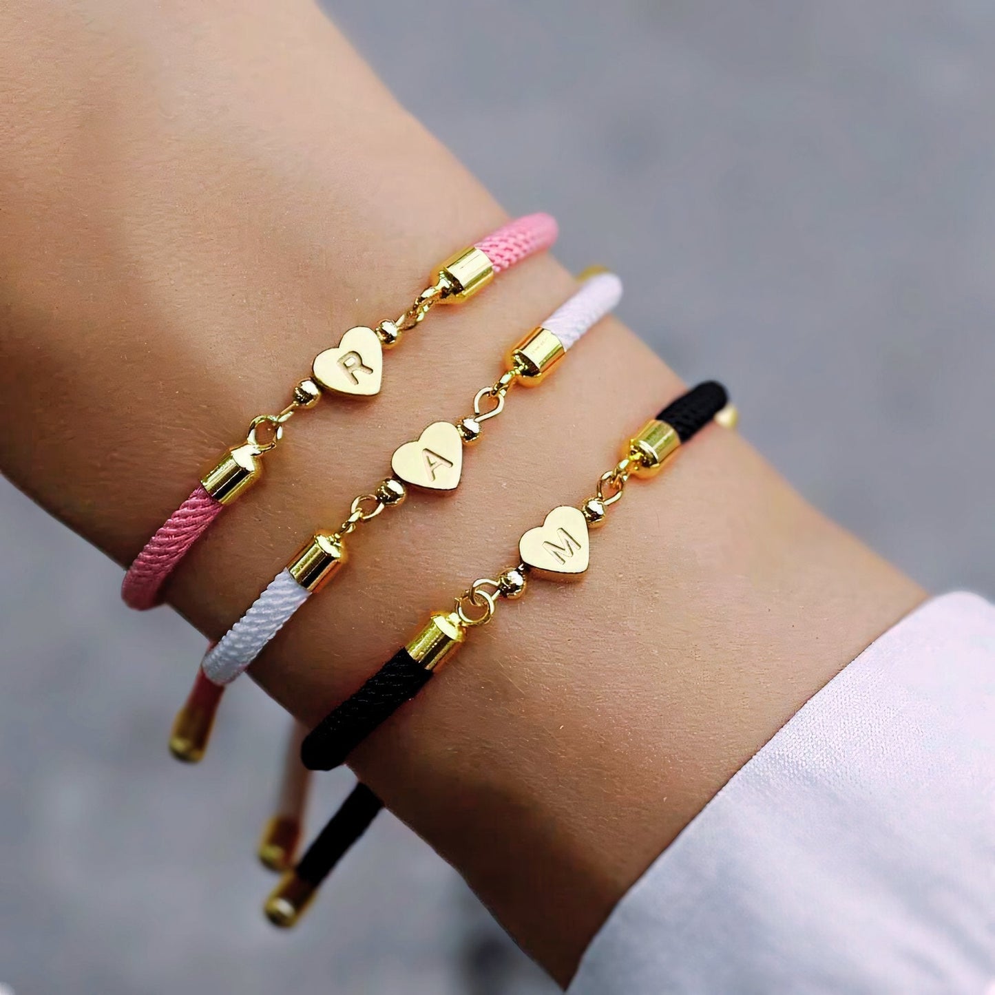 https://cdn.shopify.com/s/files/1/0820/4999/0943/files/adjustable-heart-letter-initial-bracelets-502801.jpg?v=1762197986