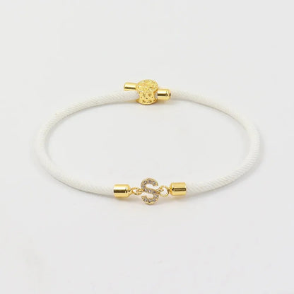 https://cdn.shopify.com/s/files/1/0820/4999/0943/files/adjustable-letter-initial-bracelets-253134.webp?v=1735136815