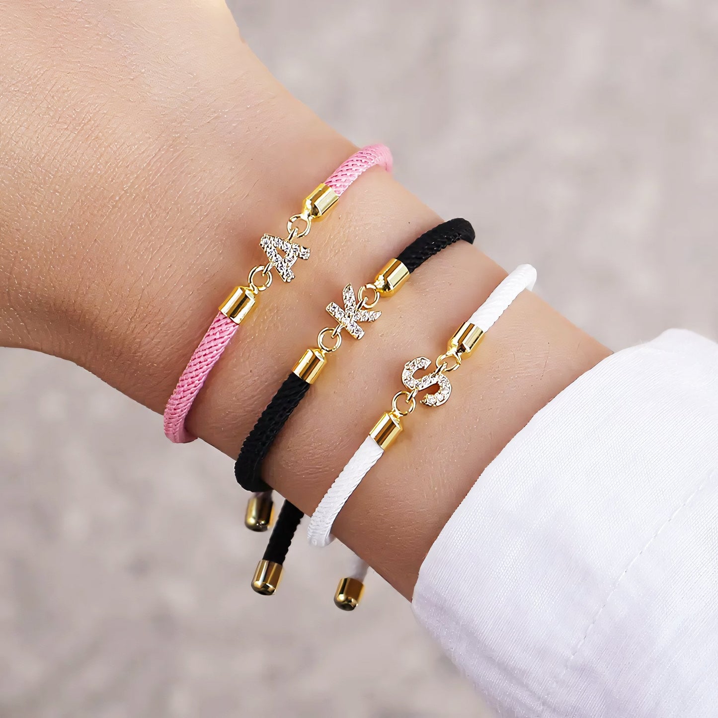 https://cdn.shopify.com/s/files/1/0820/4999/0943/files/adjustable-letter-initial-bracelets-992887.jpg?v=1762197981