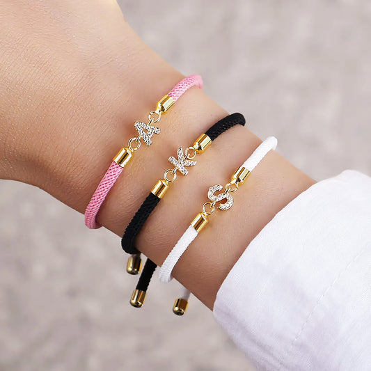 https://cdn.shopify.com/s/files/1/0820/4999/0943/files/adjustable-letter-initial-bracelets-992887.jpg?v=1762197981