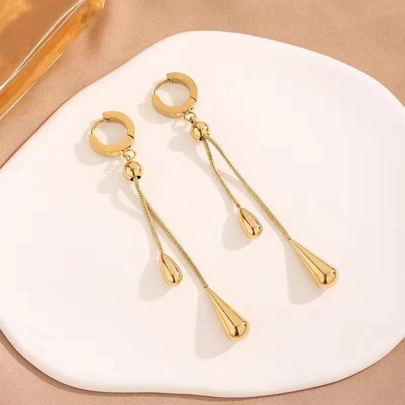 https://cdn.shopify.com/s/files/1/0820/4999/0943/files/adjustable-pull-droplet-lariat-necklace-and-earrings-320608.webp?v=1720179727
