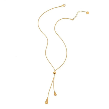 https://cdn.shopify.com/s/files/1/0820/4999/0943/files/adjustable-pull-droplet-lariat-necklace-and-earrings-915653.webp?v=1720179727
