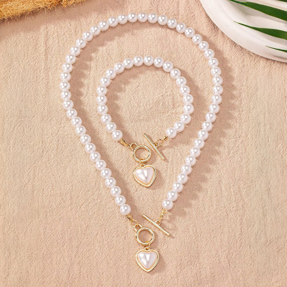https://cdn.shopify.com/s/files/1/0820/4999/0943/files/beaded-heart-pendant-bracelet-and-necklace-set-277418.jpg?v=1720594119