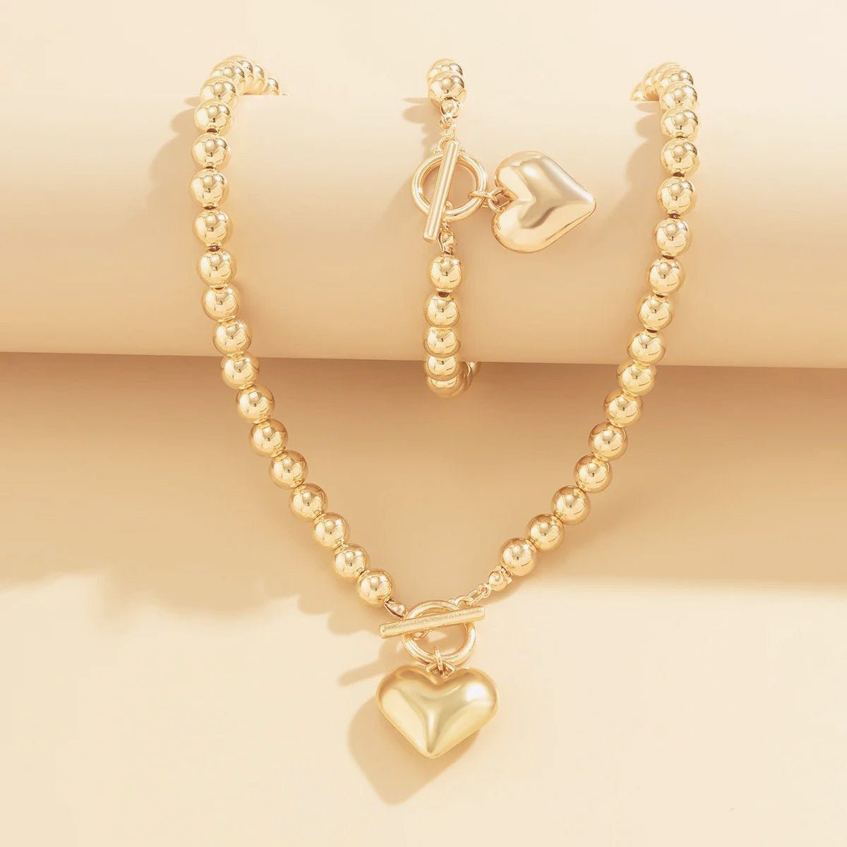 https://cdn.shopify.com/s/files/1/0820/4999/0943/files/beaded-heart-pendant-bracelet-and-necklace-set-370863.jpg?v=1720594119