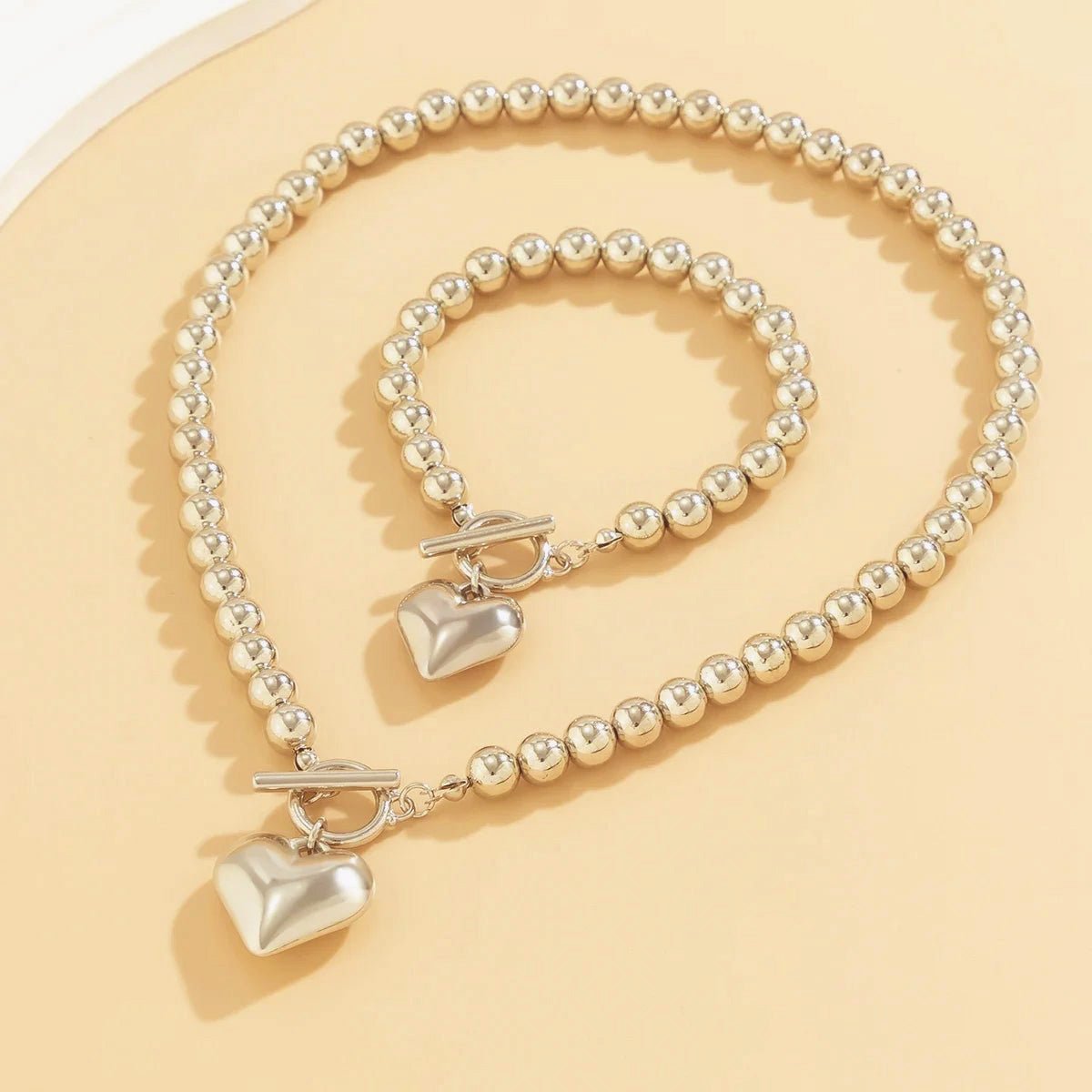 https://cdn.shopify.com/s/files/1/0820/4999/0943/files/beaded-heart-pendant-bracelet-and-necklace-set-533240.jpg?v=1720594119