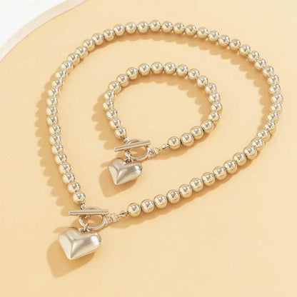 https://cdn.shopify.com/s/files/1/0820/4999/0943/files/beaded-heart-pendant-bracelet-and-necklace-set-533240.jpg?v=1720594119