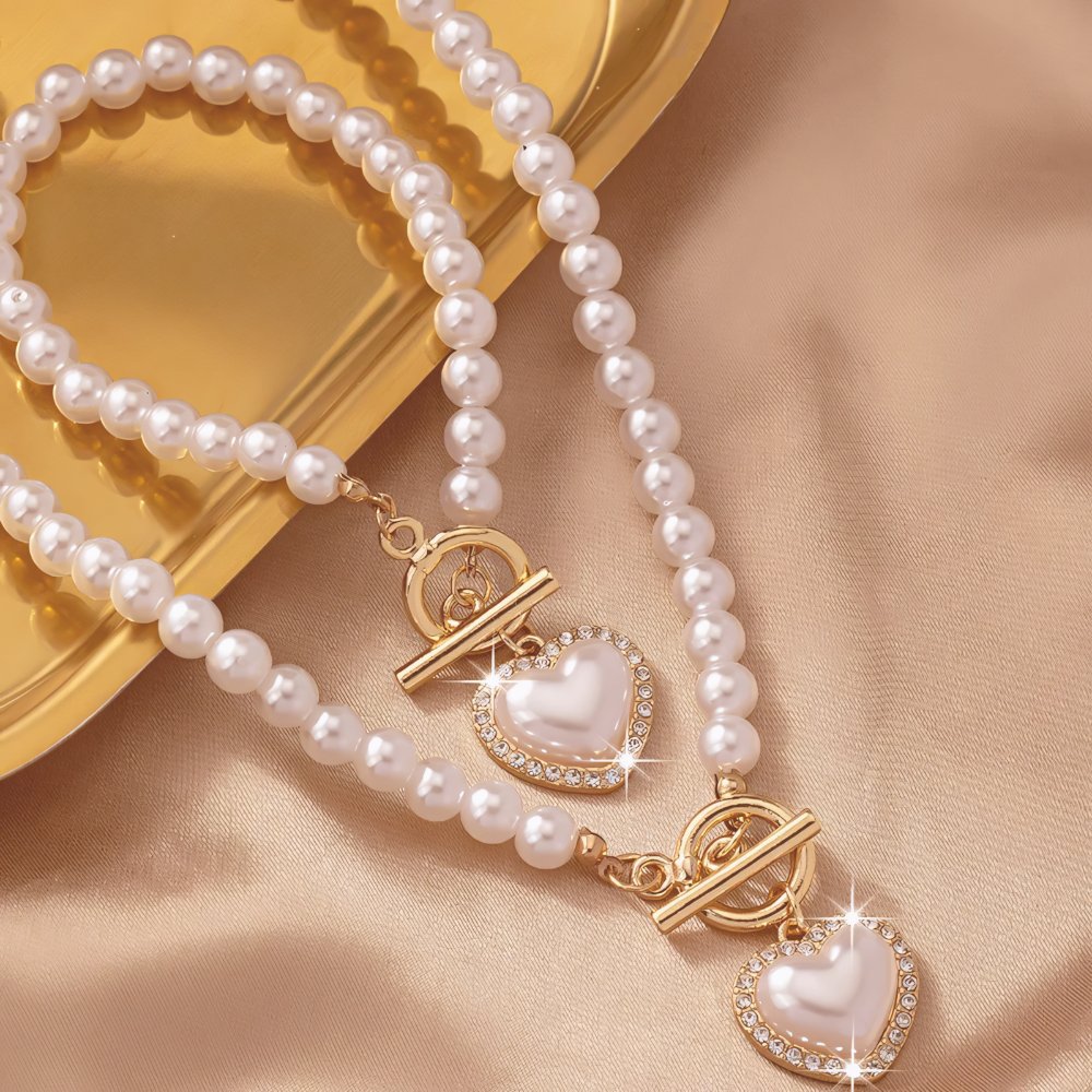 https://cdn.shopify.com/s/files/1/0820/4999/0943/files/beaded-heart-pendant-bracelet-and-necklace-set-672931.jpg?v=1720594119