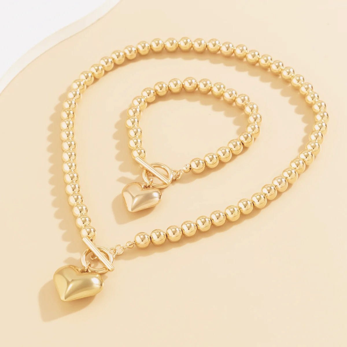 https://cdn.shopify.com/s/files/1/0820/4999/0943/files/beaded-heart-pendant-bracelet-and-necklace-set-695251.jpg?v=1720594119