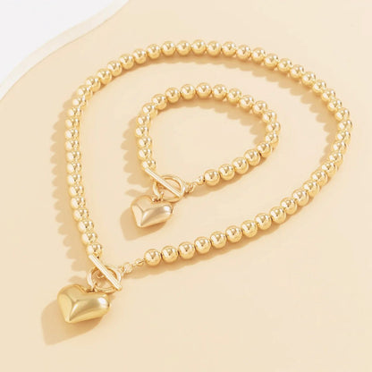 https://cdn.shopify.com/s/files/1/0820/4999/0943/files/beaded-heart-pendant-bracelet-and-necklace-set-695251.jpg?v=1720594119