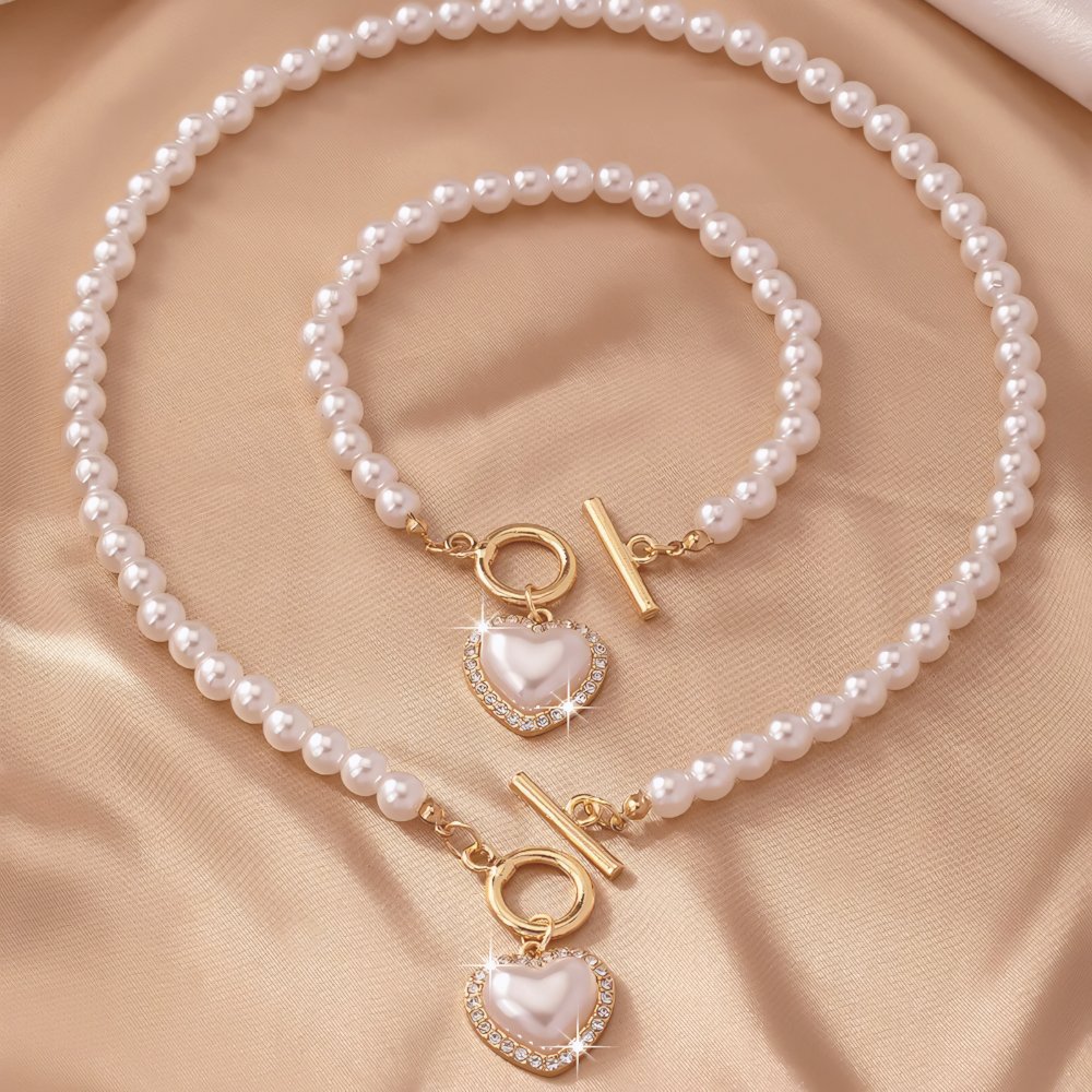 https://cdn.shopify.com/s/files/1/0820/4999/0943/files/beaded-heart-pendant-bracelet-and-necklace-set-711933.jpg?v=1720594119