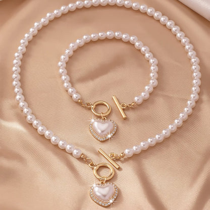 https://cdn.shopify.com/s/files/1/0820/4999/0943/files/beaded-heart-pendant-bracelet-and-necklace-set-711933.jpg?v=1720594119