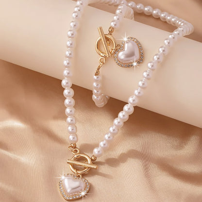 https://cdn.shopify.com/s/files/1/0820/4999/0943/files/beaded-heart-pendant-bracelet-and-necklace-set-912654.jpg?v=1720594119
