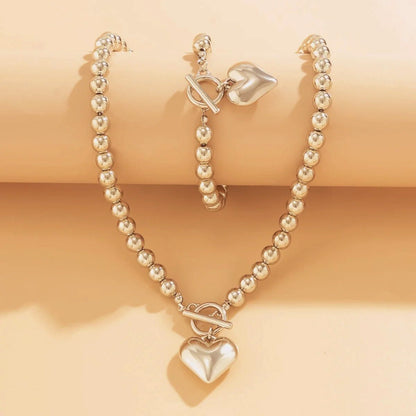https://cdn.shopify.com/s/files/1/0820/4999/0943/files/beaded-heart-pendant-bracelet-and-necklace-set-936167.jpg?v=1720594119