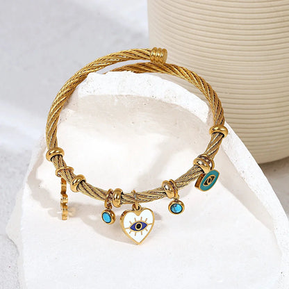 https://cdn.shopify.com/s/files/1/0820/4999/0943/files/boho-evil-eye-rope-bangle-bracelet-158058.webp?v=1718605382