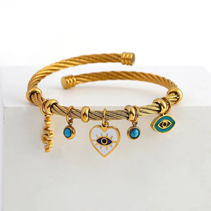 https://cdn.shopify.com/s/files/1/0820/4999/0943/files/boho-evil-eye-rope-bangle-bracelet-968005.webp?v=1762198341