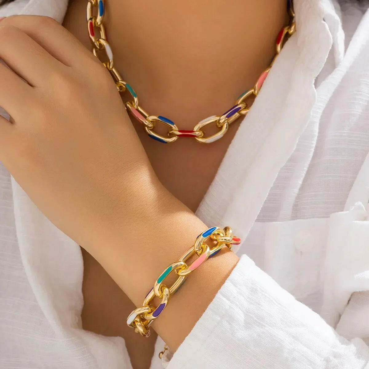 https://cdn.shopify.com/s/files/1/0820/4999/0943/files/colorful-chain-bracelet-and-necklace-set-266088.webp?v=1718522479