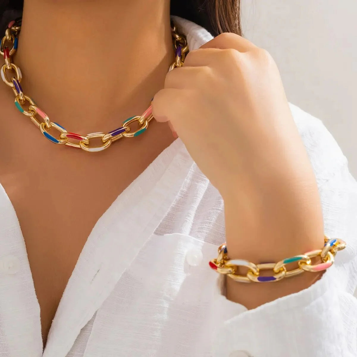https://cdn.shopify.com/s/files/1/0820/4999/0943/files/colorful-chain-bracelet-and-necklace-set-536613.webp?v=1718522479