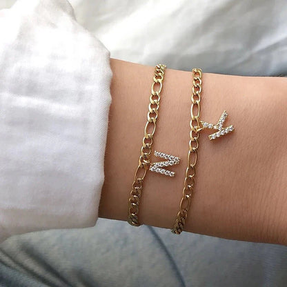 https://cdn.shopify.com/s/files/1/0820/4999/0943/files/dainty-cuban-figaro-chain-letter-initial-bracelet-520995.webp?v=1762198560