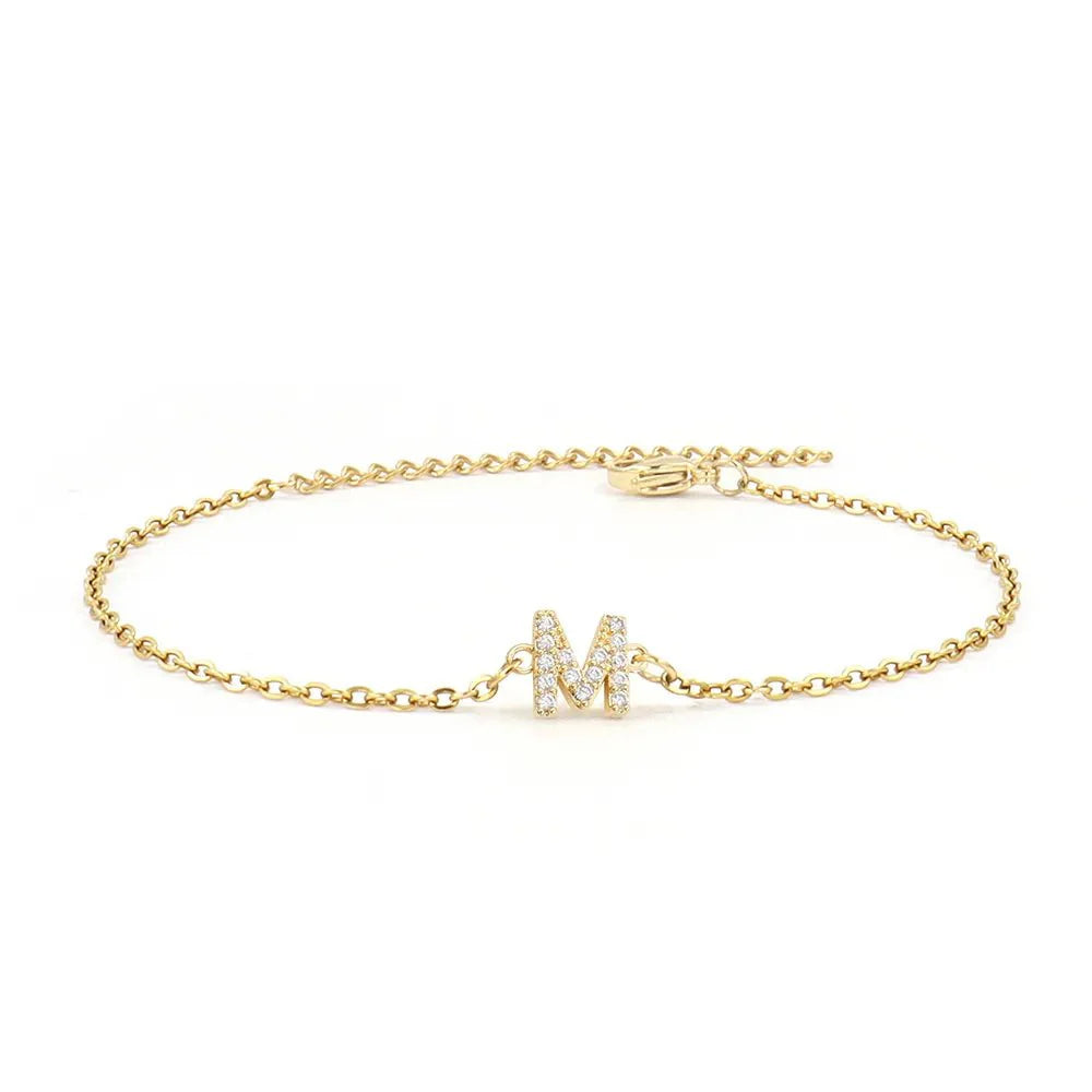 https://cdn.shopify.com/s/files/1/0820/4999/0943/files/dainty-initial-chain-bracelet-715874.webp?v=1723746987