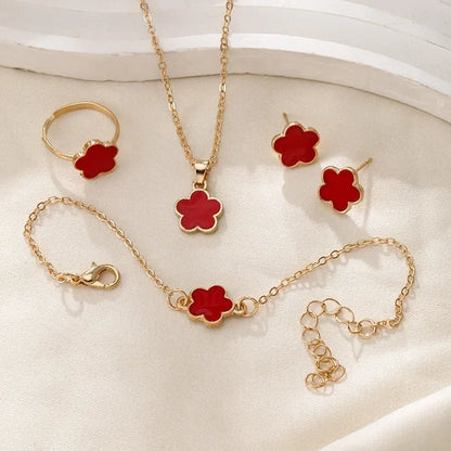 https://cdn.shopify.com/s/files/1/0820/4999/0943/files/dainty-lucky-floral-clover-necklace-bracelet-earrings-and-rings-set-142594.webp?v=1721505599