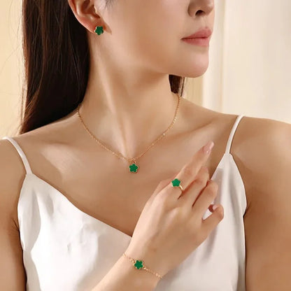 https://cdn.shopify.com/s/files/1/0820/4999/0943/files/dainty-lucky-floral-clover-necklace-bracelet-earrings-and-rings-set-306462.webp?v=1762198434