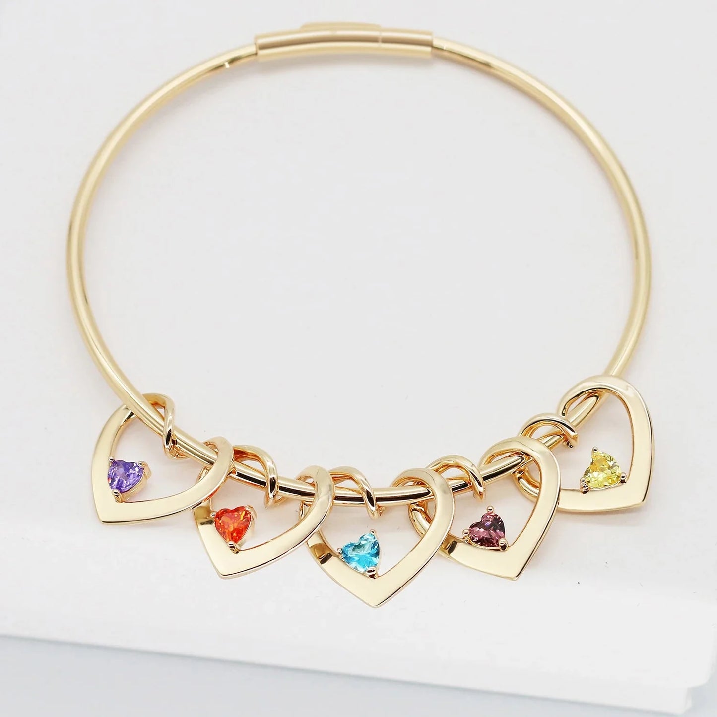 https://cdn.shopify.com/s/files/1/0820/4999/0943/files/dainty-name-birthstone-heart-charm-bangle-bracelet-necklace-590532.webp?v=1724654253