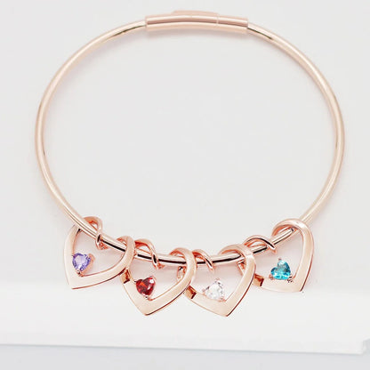 https://cdn.shopify.com/s/files/1/0820/4999/0943/files/dainty-name-birthstone-heart-charm-bangle-bracelet-necklace-659576.webp?v=1724654253