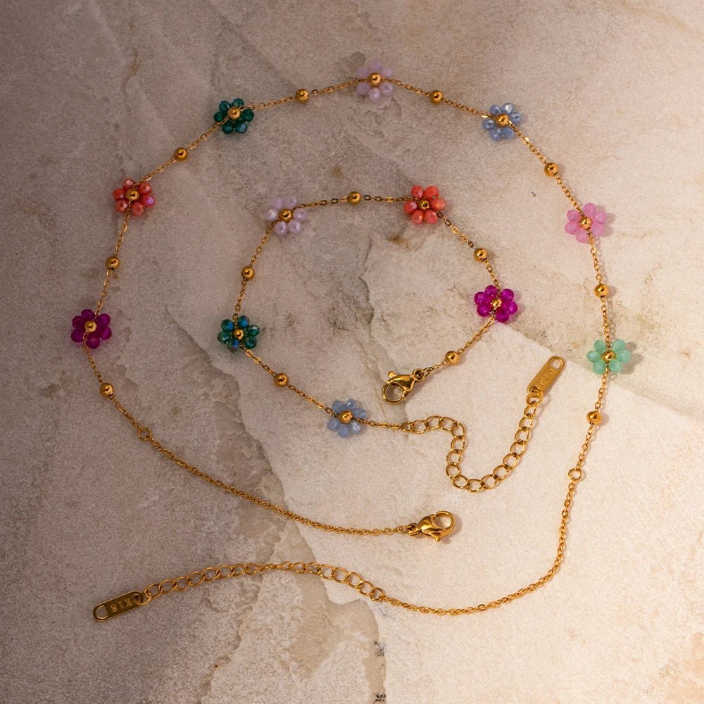 https://cdn.shopify.com/s/files/1/0820/4999/0943/files/dainty-spring-floral-bracelet-and-necklace-110899.jpg?v=1712675939
