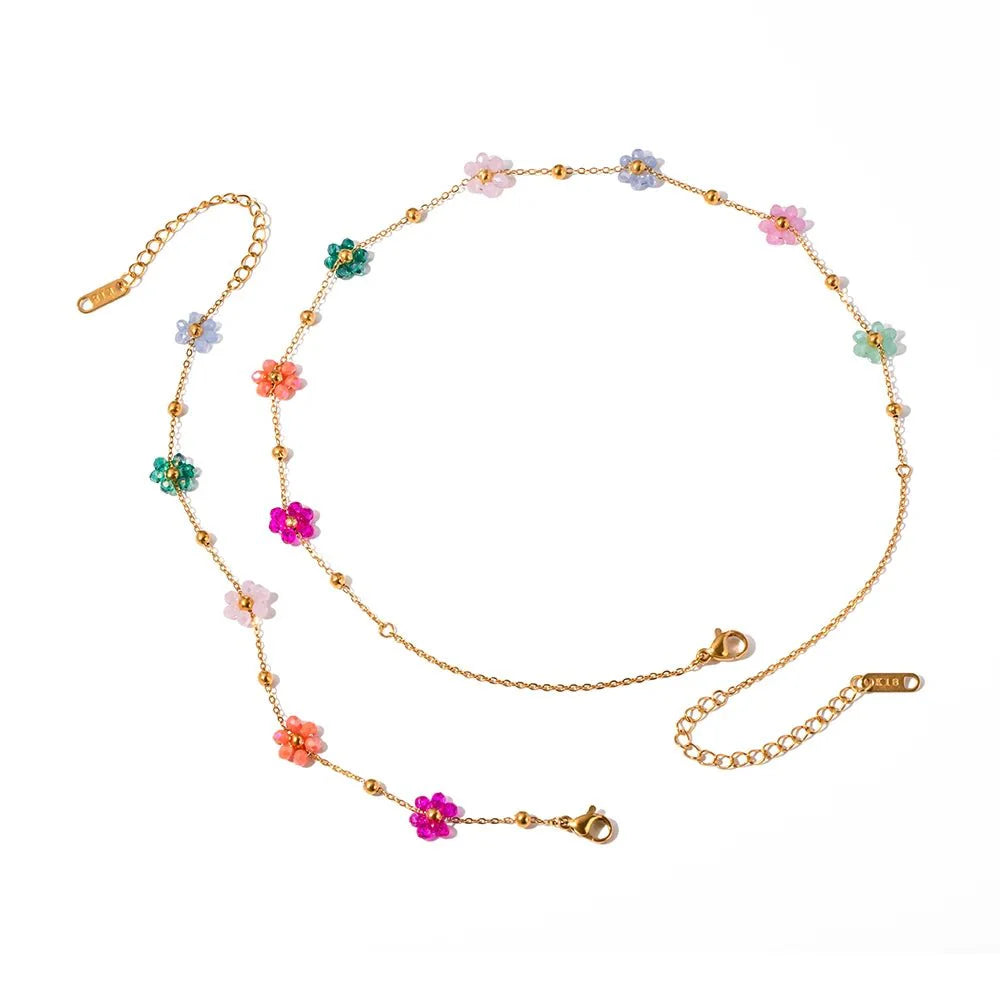 https://cdn.shopify.com/s/files/1/0820/4999/0943/files/dainty-spring-floral-bracelet-and-necklace-365735.webp?v=1712675939