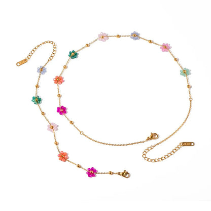 https://cdn.shopify.com/s/files/1/0820/4999/0943/files/dainty-spring-floral-bracelet-and-necklace-365735.webp?v=1712675939