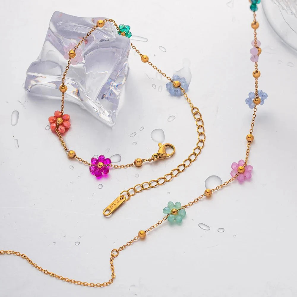 https://cdn.shopify.com/s/files/1/0820/4999/0943/files/dainty-spring-floral-bracelet-and-necklace-617877.webp?v=1712675939