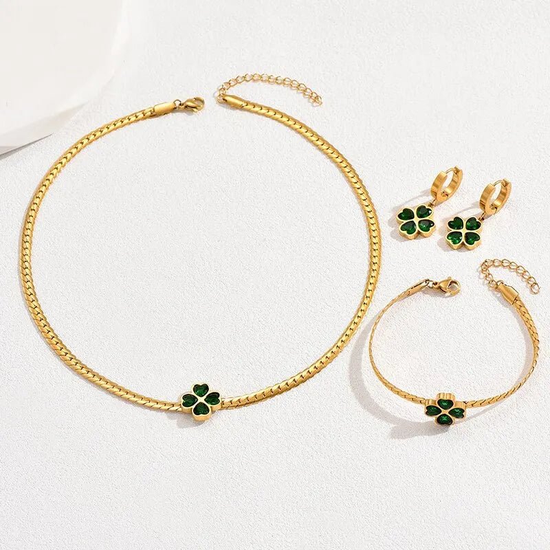 https://cdn.shopify.com/s/files/1/0820/4999/0943/files/emerald-four-leaf-clover-necklace-bracelet-and-earring-set-676465.webp?v=1716242308