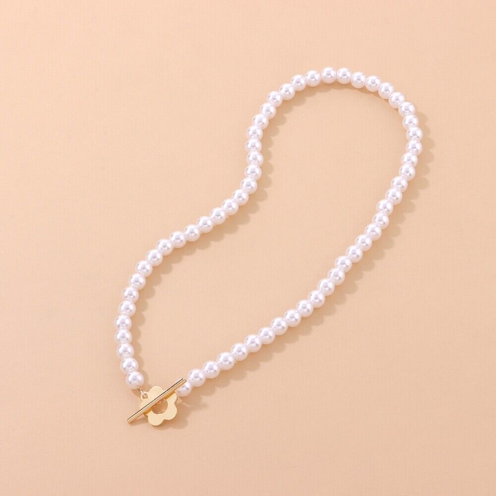 https://cdn.shopify.com/s/files/1/0820/4999/0943/files/floral-choker-flower-clasp-necklace-189108.jpg?v=1712446269