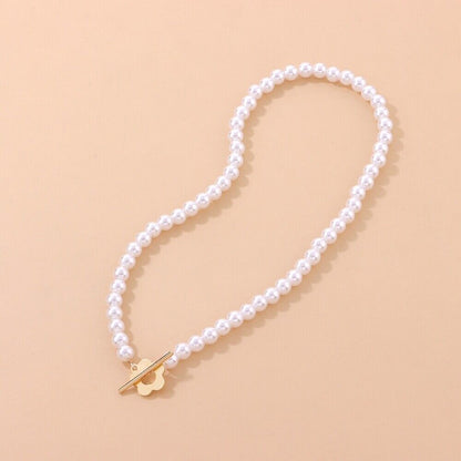 https://cdn.shopify.com/s/files/1/0820/4999/0943/files/floral-choker-flower-clasp-necklace-189108.jpg?v=1712446269