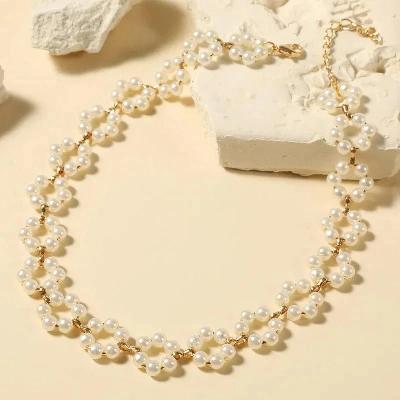 https://cdn.shopify.com/s/files/1/0820/4999/0943/files/pearl-floral-daisy-choker-necklace-795095.webp?v=1721505748