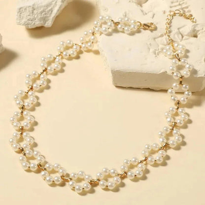 https://cdn.shopify.com/s/files/1/0820/4999/0943/files/pearl-floral-daisy-choker-necklace-795095.webp?v=1721505748