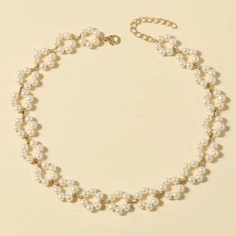 https://cdn.shopify.com/s/files/1/0820/4999/0943/files/pearl-floral-daisy-choker-necklace-941704.webp?v=1721505748
