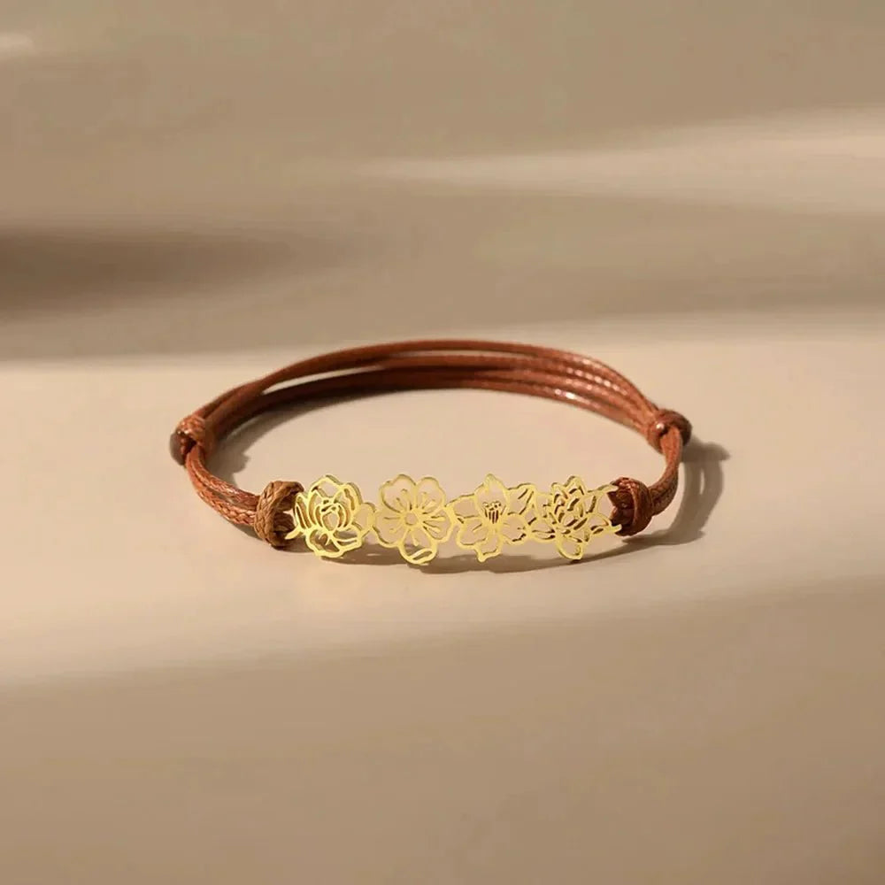 https://cdn.shopify.com/s/files/1/0820/4999/0943/files/personalized-birth-flower-bracelet-402154.webp?v=1724654281