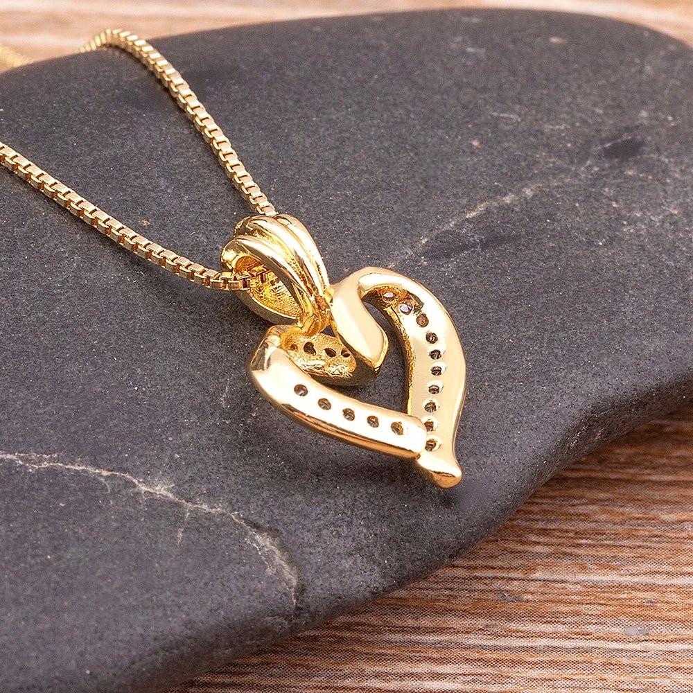 https://cdn.shopify.com/s/files/1/0820/4999/0943/files/romantic-diamond-heart-pendant-necklace-563199.webp?v=1722251350