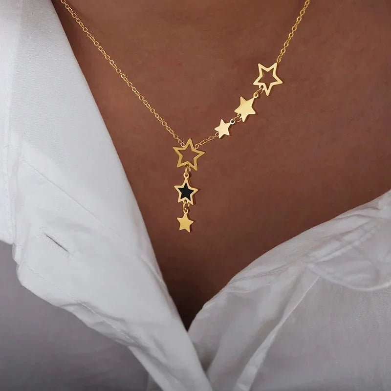 https://cdn.shopify.com/s/files/1/0820/4999/0943/files/shooting-star-celestial-necklace-528968.webp?v=1712845056