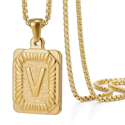 https://cdn.shopify.com/s/files/1/0820/4999/0943/files/textured-rectangle-letter-initial-necklace-499694.webp?v=1724157554