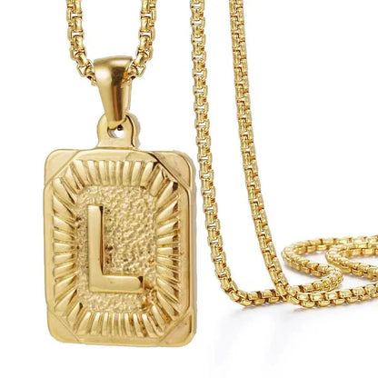 https://cdn.shopify.com/s/files/1/0820/4999/0943/files/textured-rectangle-letter-initial-necklace-799596.webp?v=1724157553